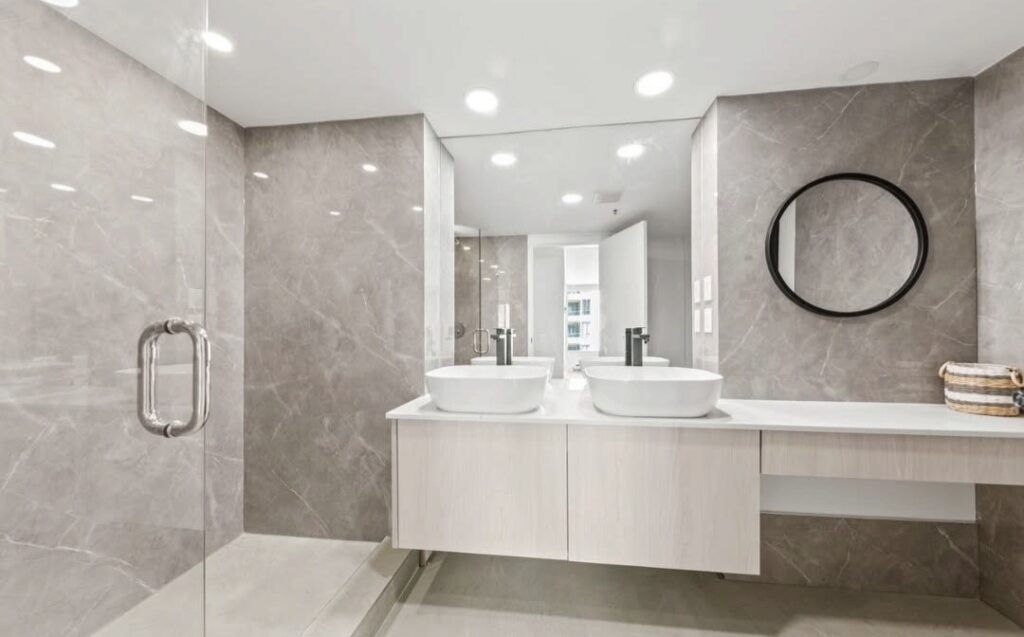Bathroom renovation at 328 Taylor Way West Vancouver with walk in shower and contemporary finishes
