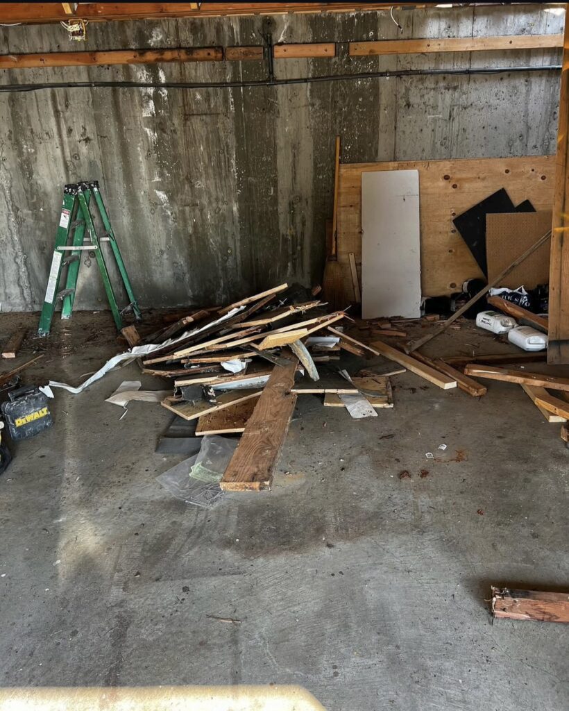 Luxury garage renovation in North Vancouver featuring high end lighting and premium car display