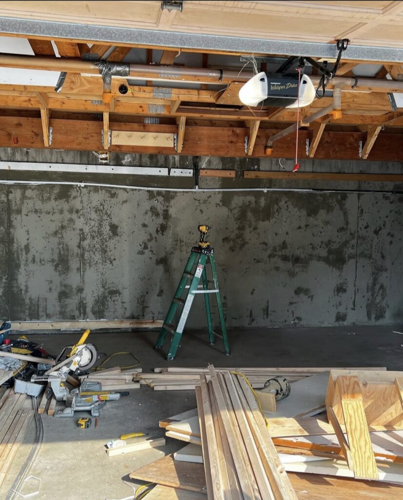 Licensed Renovation Contractors Vancouver Residential and Commercial Services 12 Modern luxury garage in North Vancouver with polished flooring and luxury vehicles