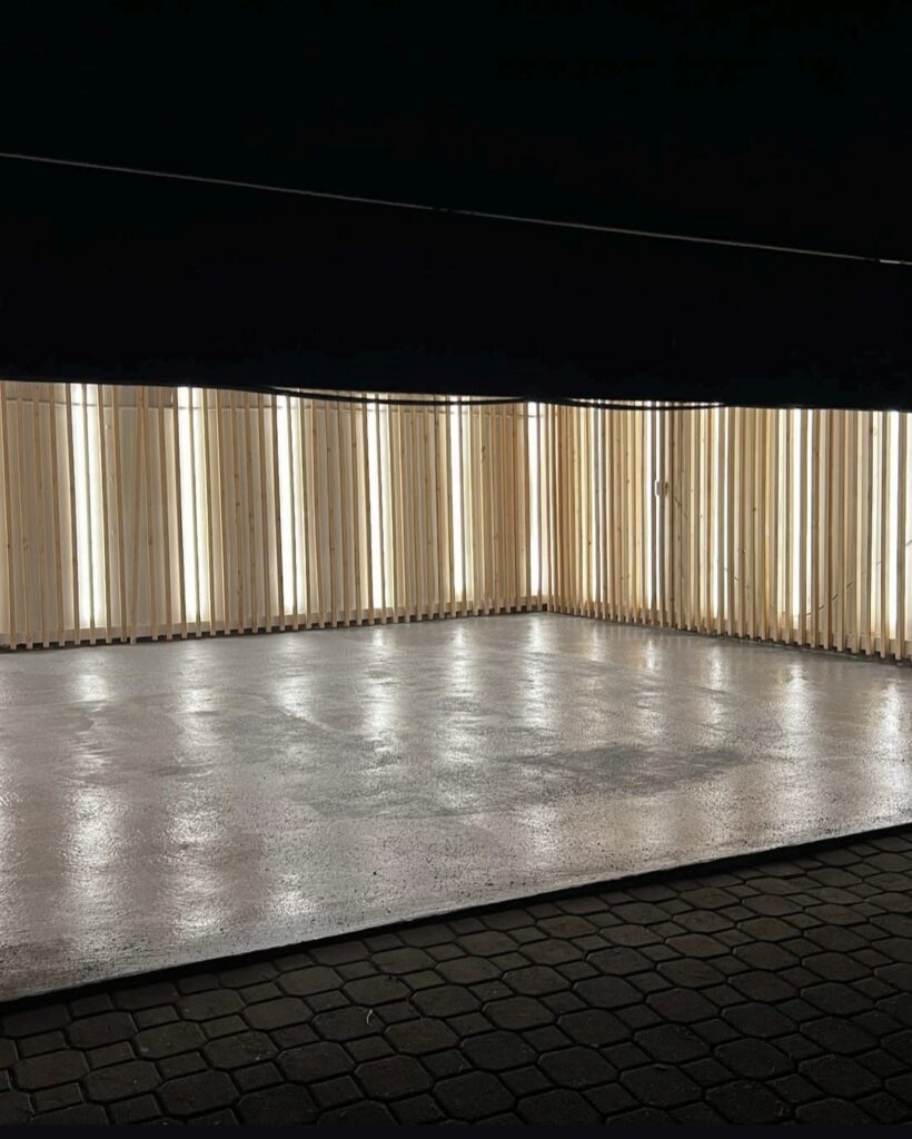 Licensed Renovation Contractors Vancouver Residential and Commercial Services 8 Upscale garage renovation in North Vancouver featuring luxury vehicles and architectural lighting