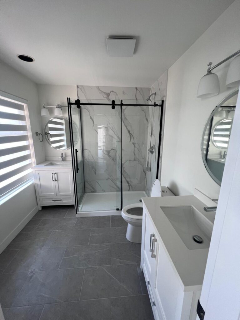 Licensed Renovation Contractors Vancouver Residential and Commercial Services 4 Modern bathroom renovation in West Vancouver completed from start to finish with walk in shower and custom tile